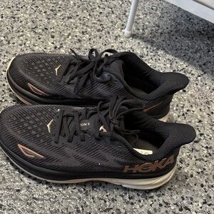Hoka Black and Copper Athletic Shoes